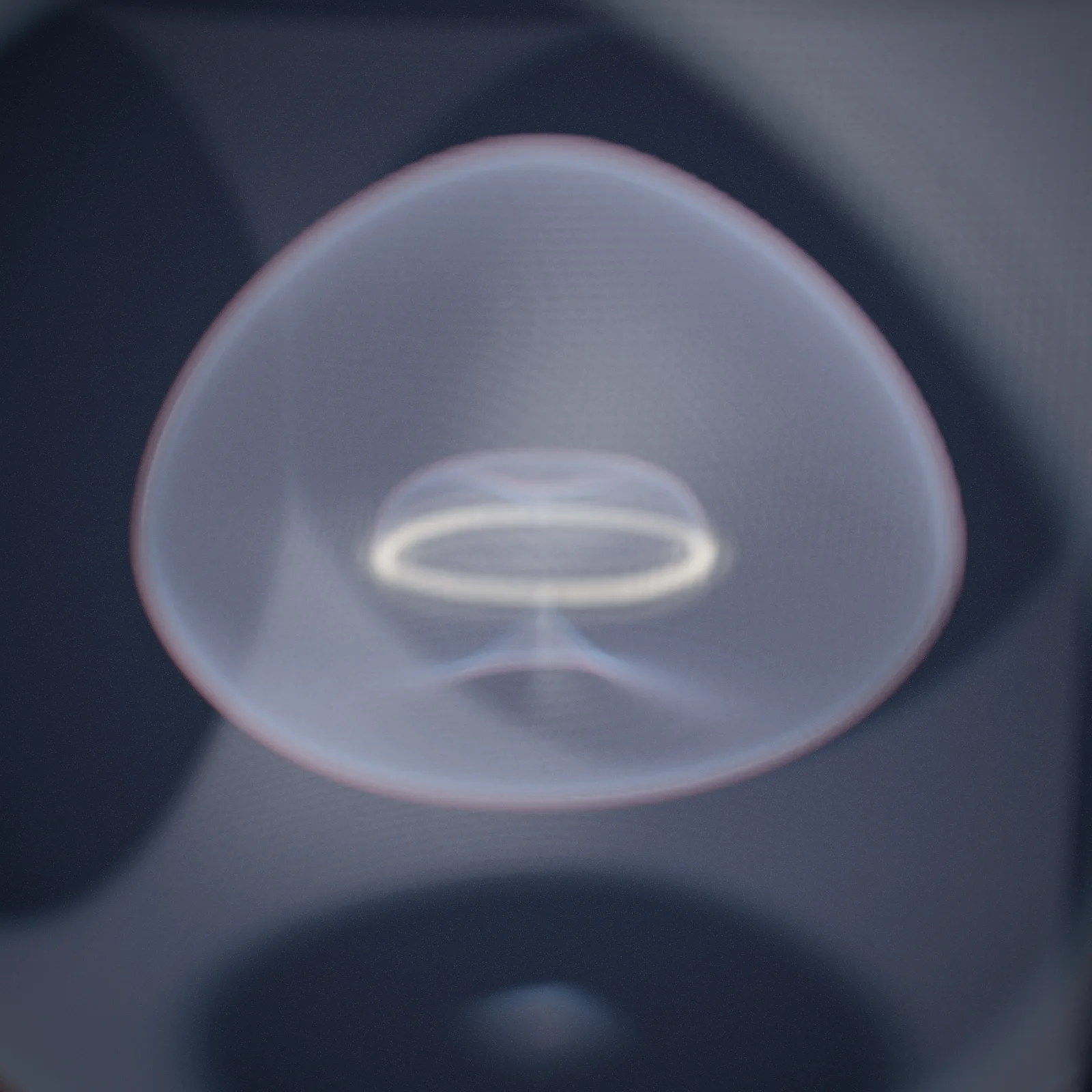 the halo in the bell — a ring inside its ignition membrane