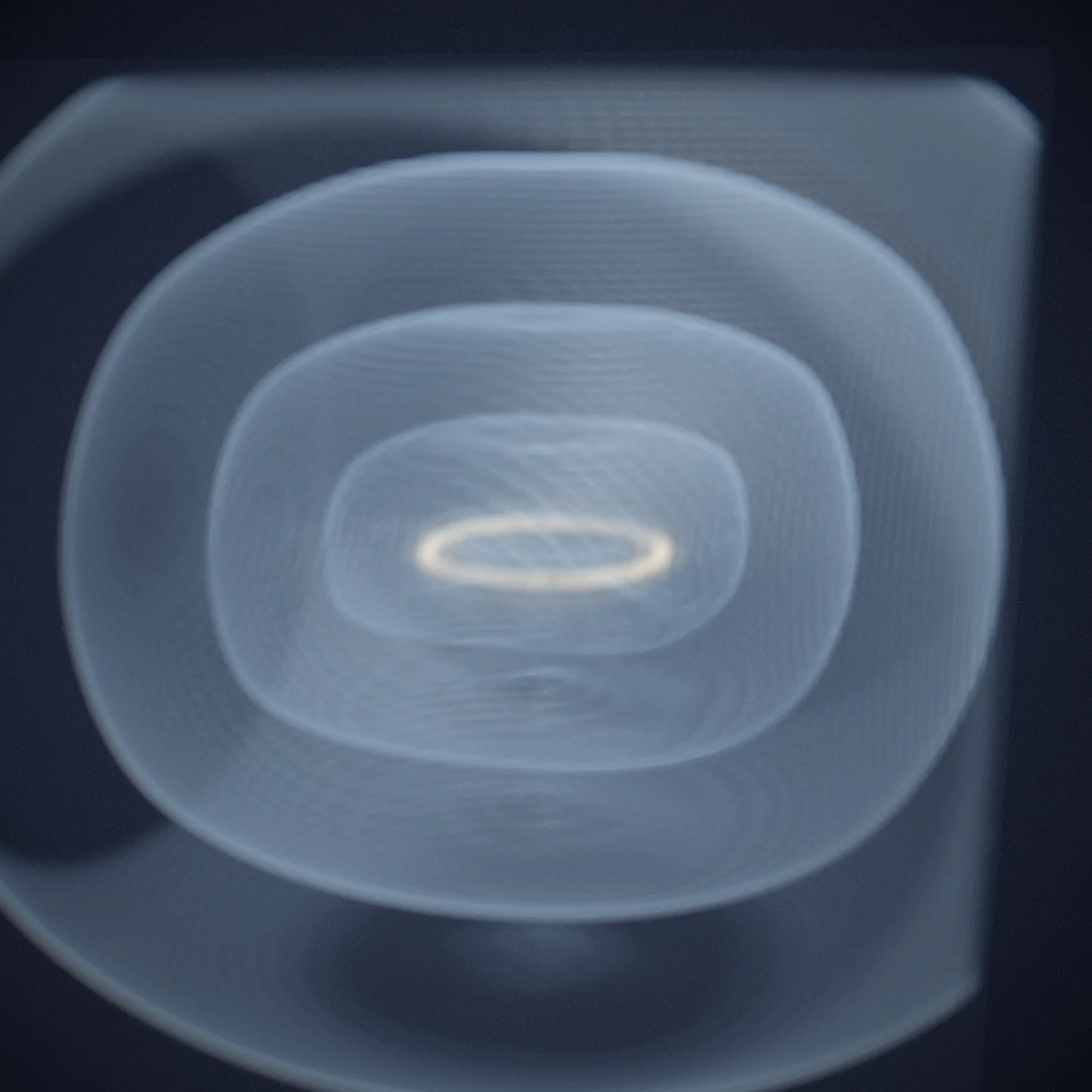 nested tori — three engraved shells the ring wove around itself