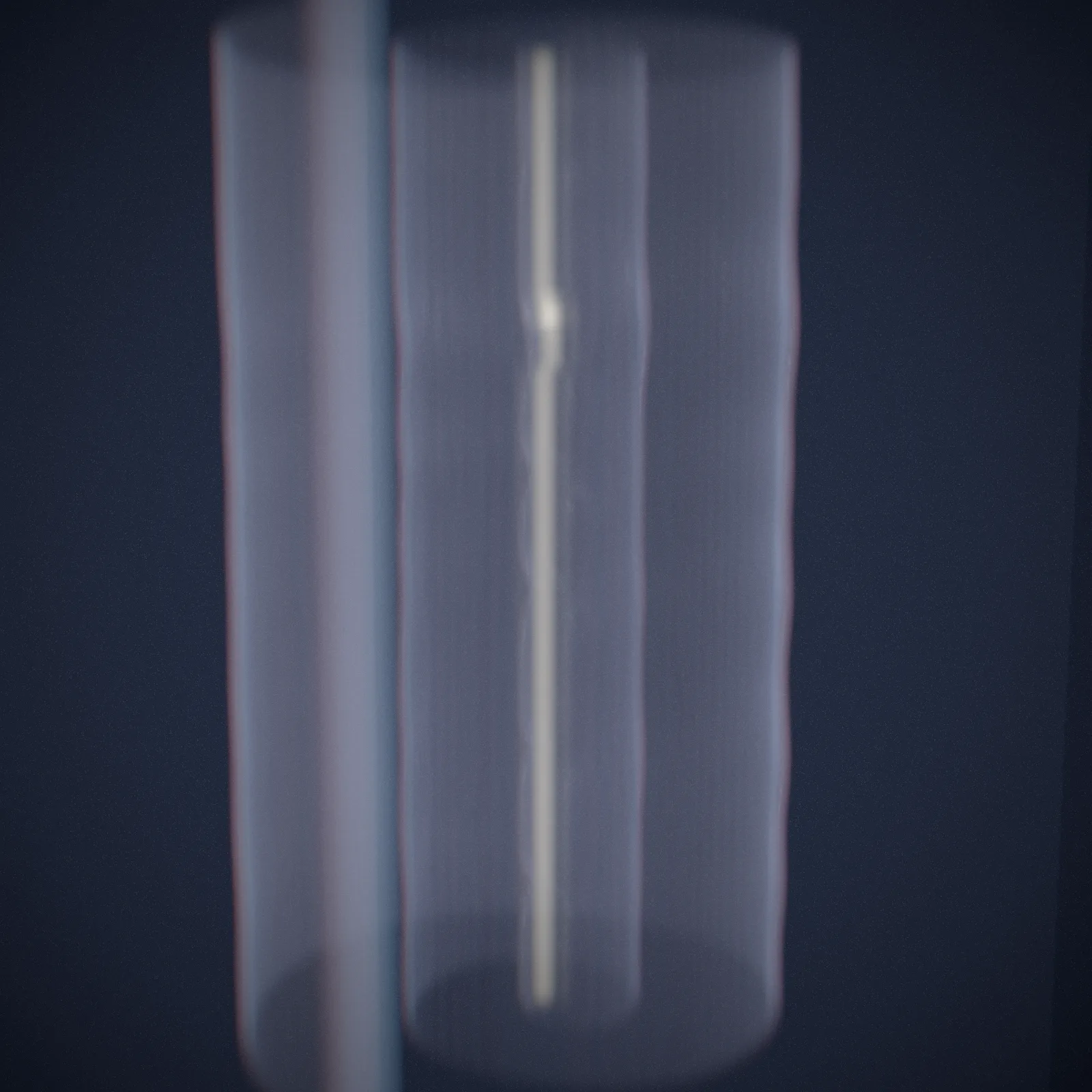 one thread — a straight filament in its rotating wave curtain